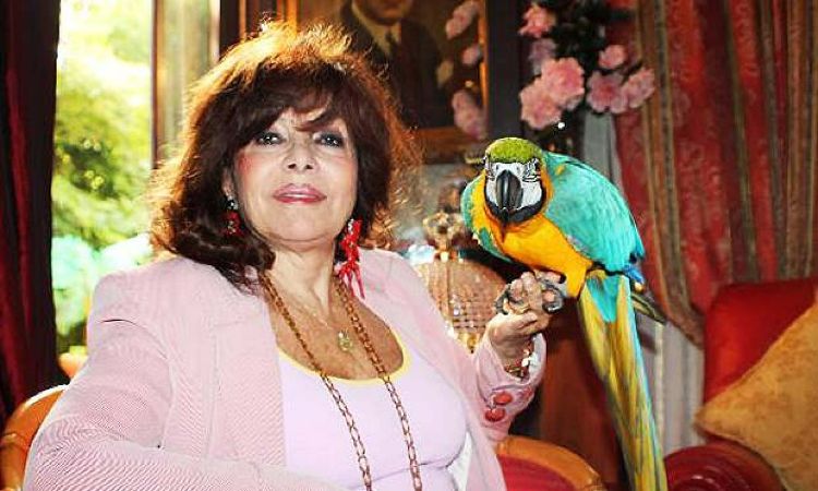 Alessandra Gucci's mother Patrizia Reggiani with her pet.